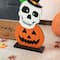 Glitzhome® 36" Halloween Wood Stacked Ghost, Frankenstein, Skull & Pumpkin Porch Décor